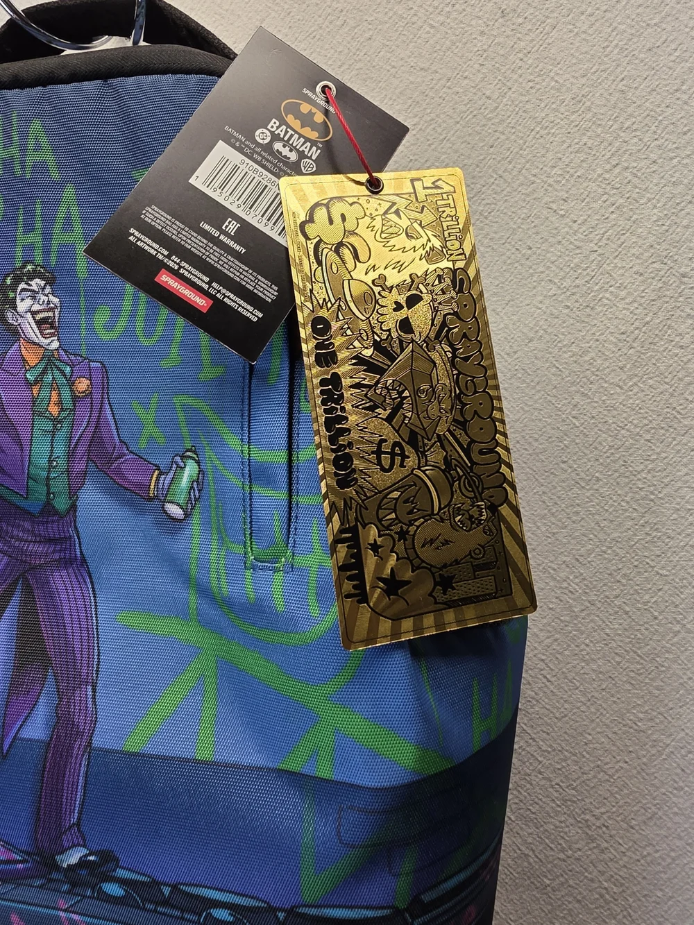 Sprayground DC Joker No Rules Backpack featuring a vibrant, graffiti-styled Bag